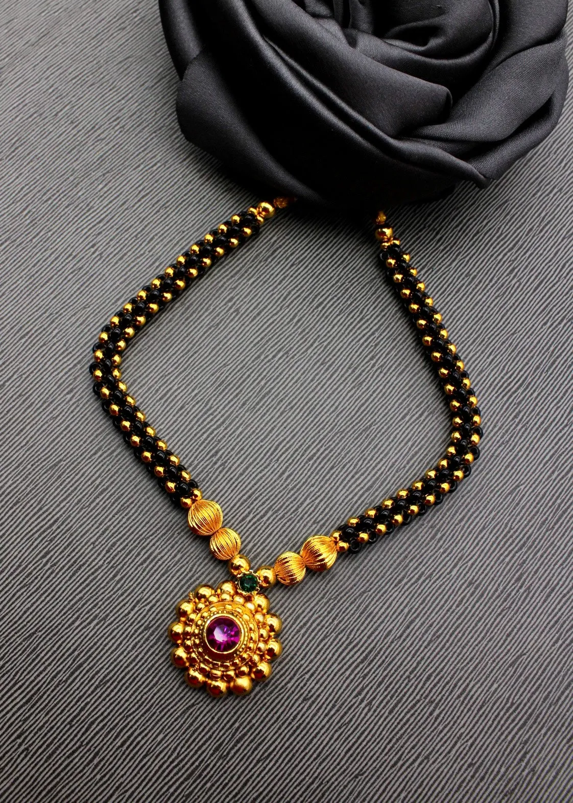 BLACK BEADED MALHAR THUSHI