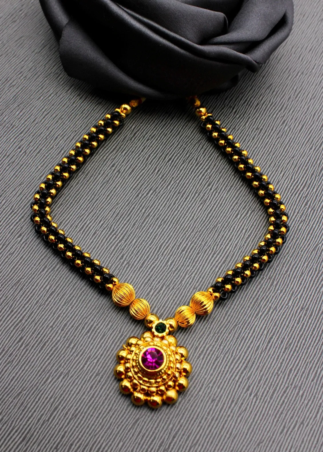 BLACK BEADED MALHAR THUSHI