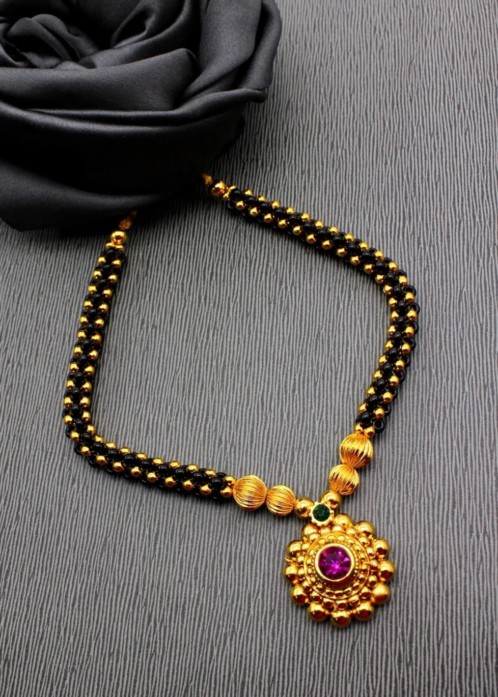 BLACK BEADED MALHAR THUSHI