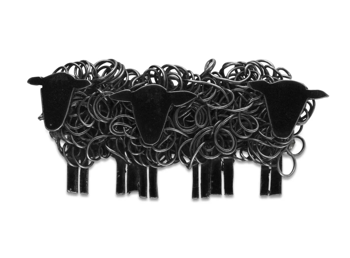 Black sheep flock silver brooch