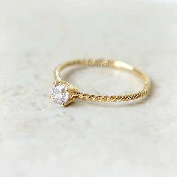 CZ twisted ring in gold plated sterling silver