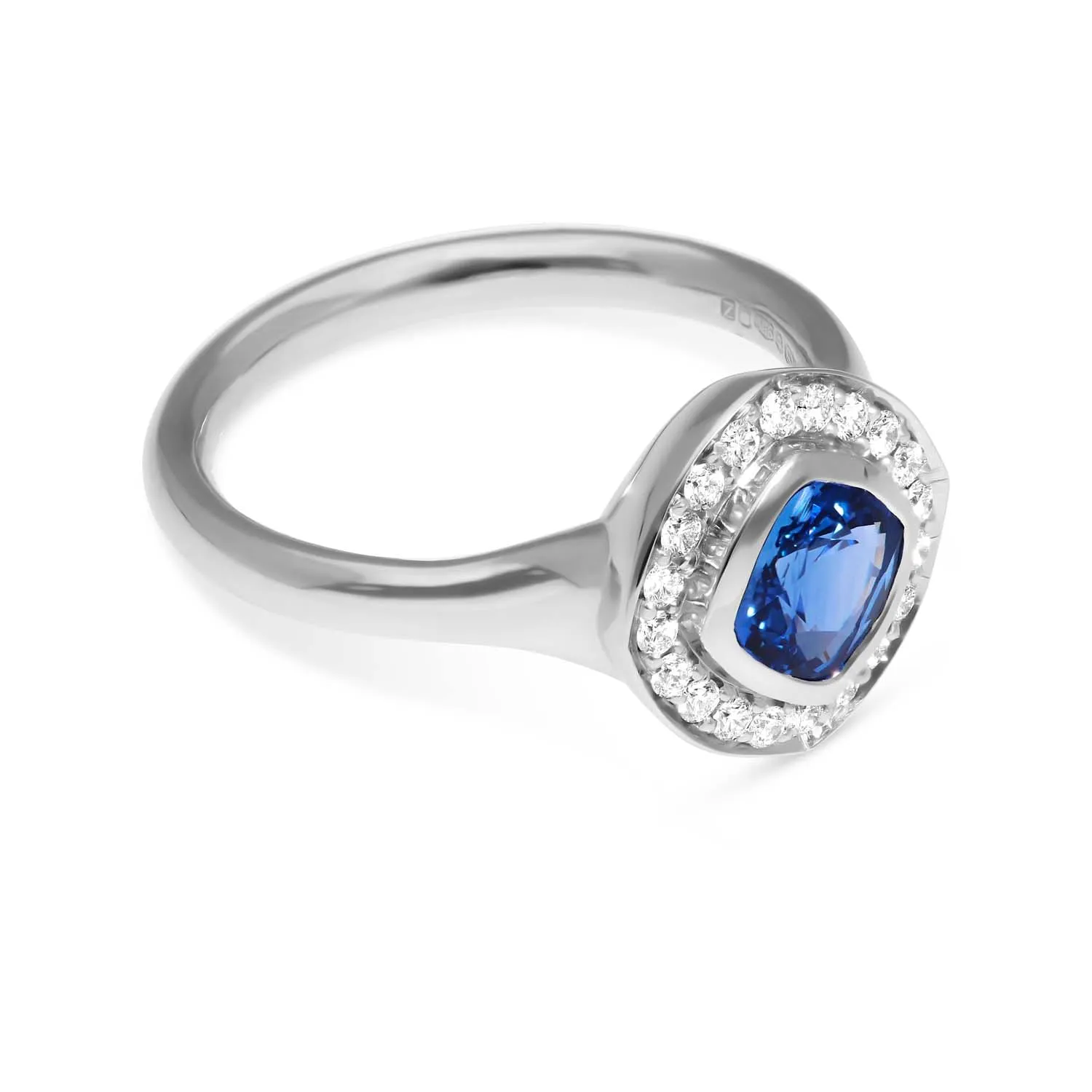 FRAME Platinum Cushion Blue Sapphire Ring with Diamond Halo