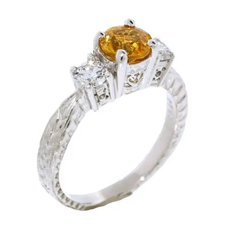 Platinum Three-Stone Yellow Sapphire and Diamond Ring